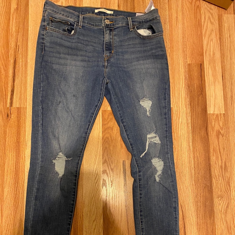 Levi’s supper skinny jean size 32 waist aka 12